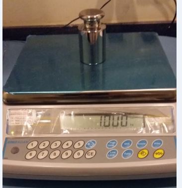 weighing-scale-with-standard-mass